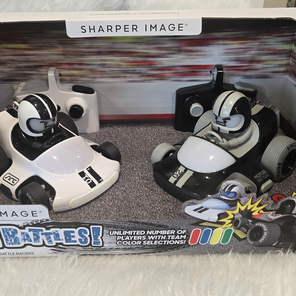 Sharper Image Black and White Futuristic Controllers‎